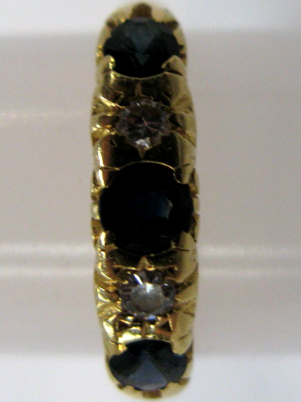 18ct Gold Sapphire and Two Diamond Ring